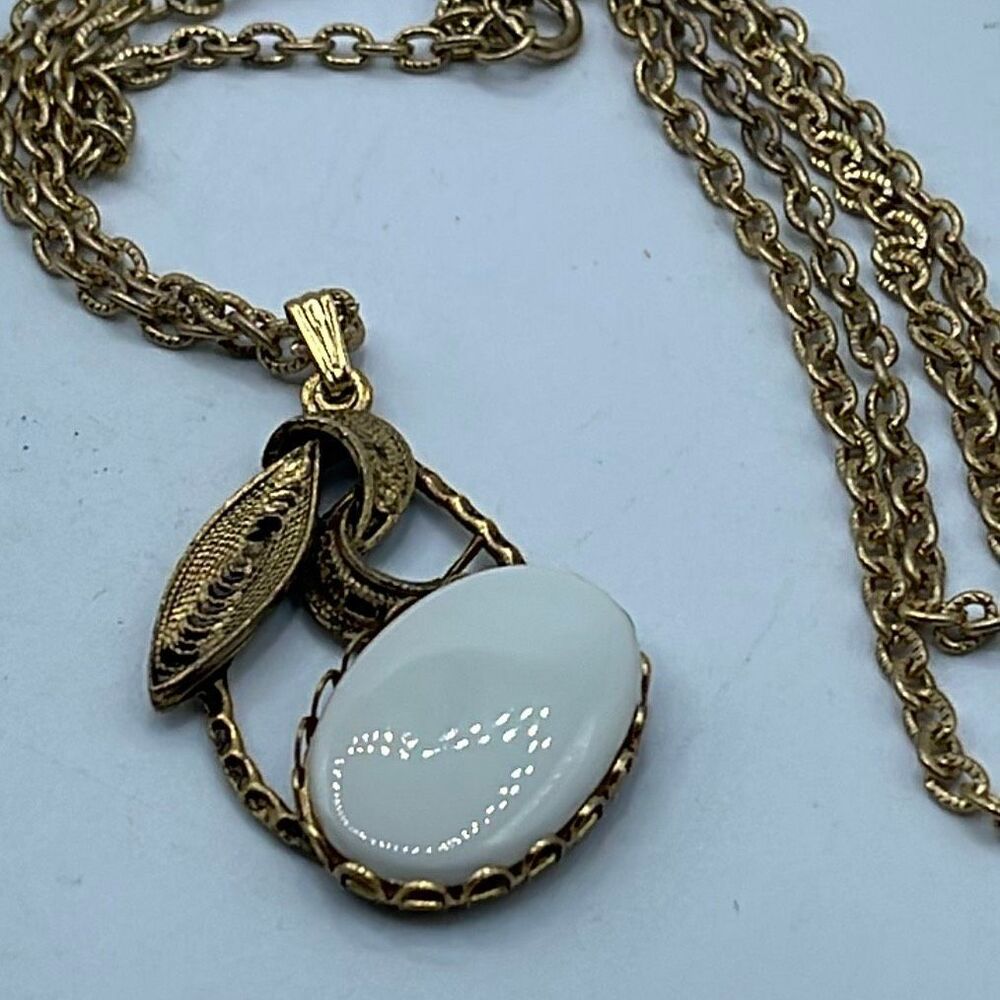 Vintage Midcentury white glass 27” necklace.